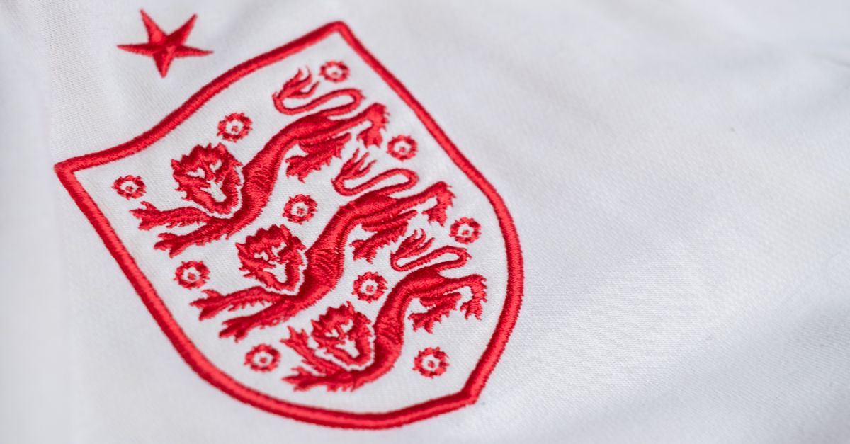 Detailed look at the England national football team's emblem on a jersey.